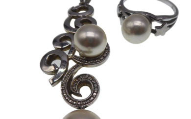 PEARL STUDDED PENDANT WITH MATCHING 925 SILVER RING.