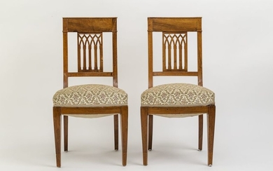Pair of Biedermeier chairs. Walnut. Upholstered seat. Backrest...