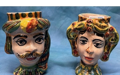 Pair of antique Sicilian pottery moor head beakers with make...