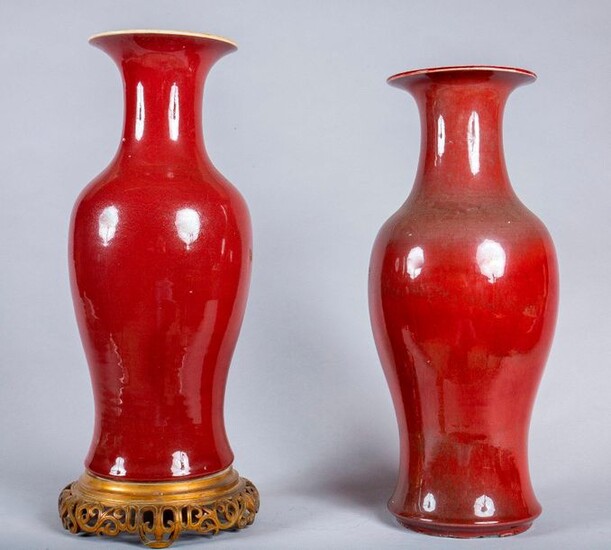 Pair of ox blood porcelain cone vases, one...