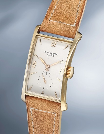 Patek Philippe, Ref. 1593 An unusual and attractive yellow gold rectangular wristwatch with faceted crystal