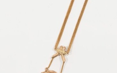 Pendant necklace in yellow gold, decorated with horns of plenty...