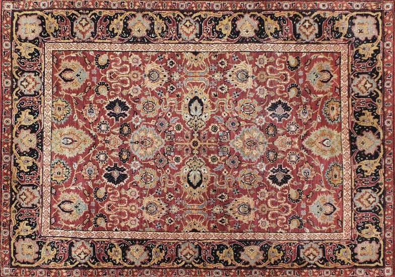 Rectangular Indian rug having an all over floral design