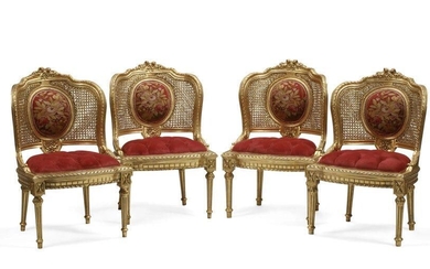 SET OF 4 LOUIS XVI STYLE CANED AND GILTWOOD CHAISES