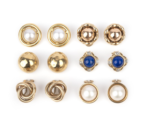 Six pairs of gold ear clips