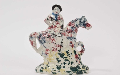 Staffordshire spongeware figure of a woman on horseback