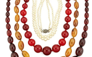 THREE FAUX AMBER NECKLACES AND A CULTURED PEARL