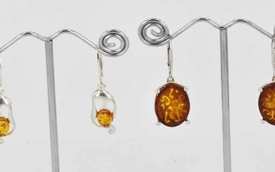 TWO PAIRS OF AMBER SET EARRINGS