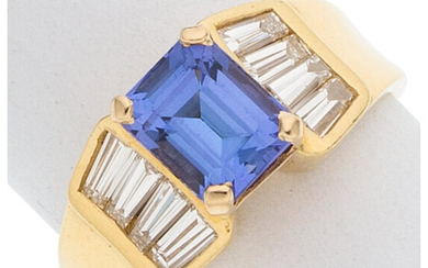 Tanzanite, Diamond, Gold Ring The ring features an emerald-cut...
