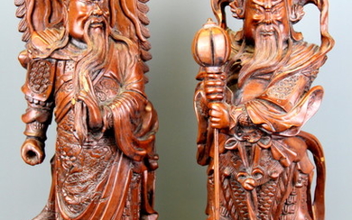 Two Chinese carved hardwood figures of guardian deities, H. 41.5cm. (A/F to one hand)