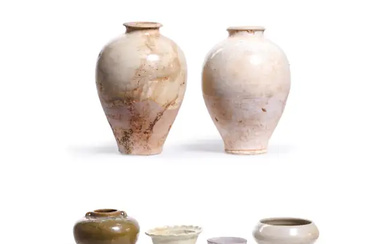 Two similar Chinese Nian ware white pottery vases, three celadon vessels, and...