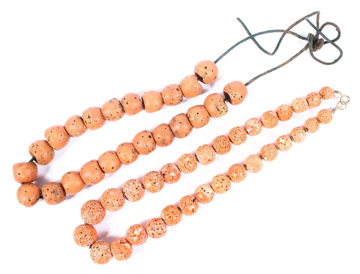 Two strands of Oriental carved pink coral beads