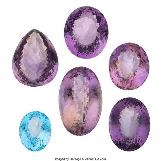 Unmounted Gemstones The lot includes two oval-shaped amethyst measuring...