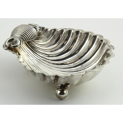 Victorian silver shell shaped butter dish (probably) on thre...
