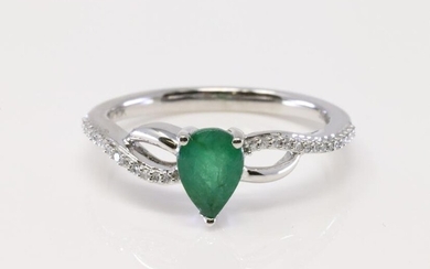 White Gold Emerald Diamond Ring.
