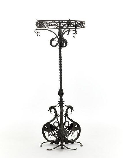 Wrought iron tripod floor lamp, with volutes with plant