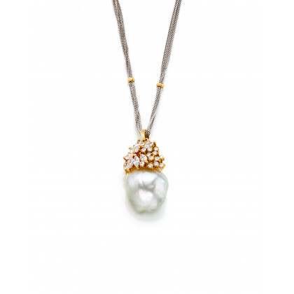 Yellow gold pendant with round and navette cut diamonds and a large baroque pearl of mm 20.70x16.03 circa, all held...