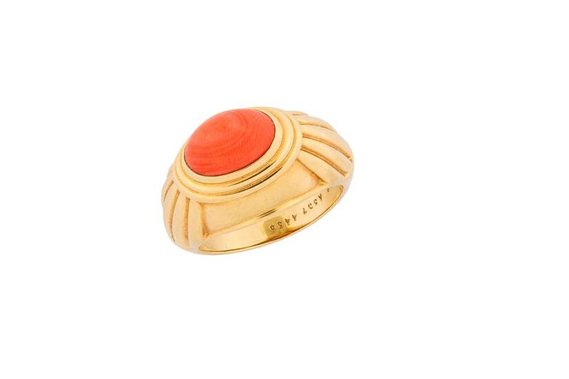 A coral dress ring, by Boucheron The pointed sugarloaf...