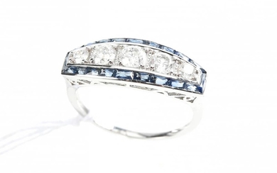 A SAPPHIRE AND DIAMOND RING IN 9CT WHITE GOLD