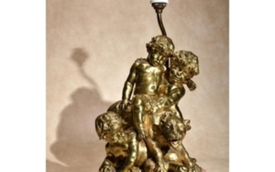 After Louis-Félix de La Rue, (French 1731 – 1765), a gilt bronze Bacchic group of a putto, two infant fauns and a panther