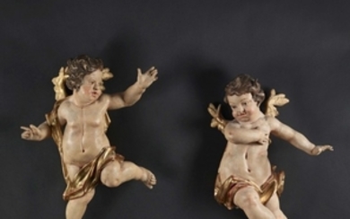 ALLEMAGNE DU SUD OU AUTRICHE, XVIIIe SIÈCLE Paire de puttis ailés Sculpture en bois polychromé et doré