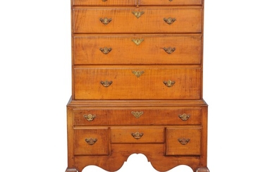 An American tiger maple chest on stand