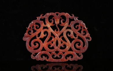 AN ANCIENT JADE ORNAMENT IN PATTERN OF DRAGONS