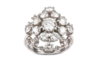 A diamond dress ring Of contoured form, set...