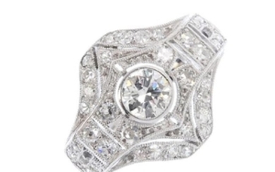 A diamond dress ring. Of geometric design, the