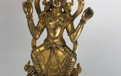 A Gilt Bronze Figurine of Buddhist Deity