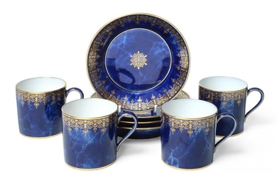 A Set of Four Sèvres Porcelain Coffee Cans and Saucers,...