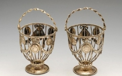 A pair of swing-handled baskets, probably George III
