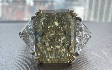 7.78 CTS PLATINUM RING WITH DIAMOND YELLOW FANCY COLOR RADIANT
