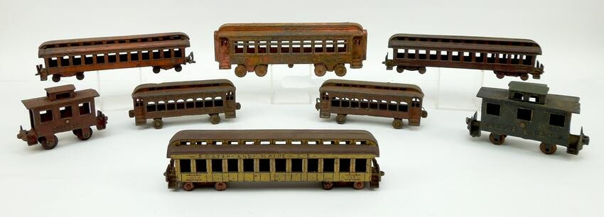 (8) Antique Cast Iron Toy Train Carriages.