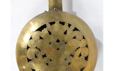 A 17TH CENTURY BRASS AND FRUITWOOD WARMING PAN, DUTCH. Havin...