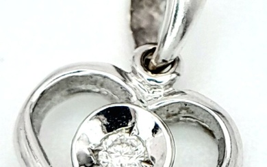 A 18ct White Gold Diamond Heart Pendant, 0.02ct diamond,...