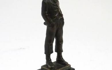 A 20thC bronze sculpture modelled as a young boy