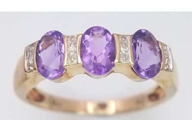 A 9K Yellow Gold Diamond and Amethyst Ring. Size P, 2.5g tot...