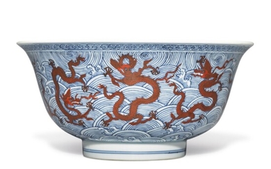 A BLUE AND WHITE AND IRON-RED 'DRAGON' BOWL, KANGXI MARK AND PERIOD