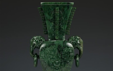 A CARVED SPINACH GREEN JADE VASE WITH DOUBLE HANDLES