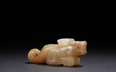 A CHINESE JADE CARVING OF DRAGON