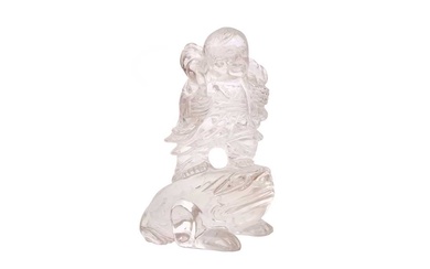 A CHINESE ROCK CRYSTAL ‘BOY AND TOAD’ CARVING 十九或二十世紀 水晶雕戲蟾童子