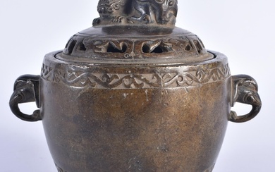 A CHINESE TWIN HANDLED BRONZE CENSER AND COVER 20th Century....