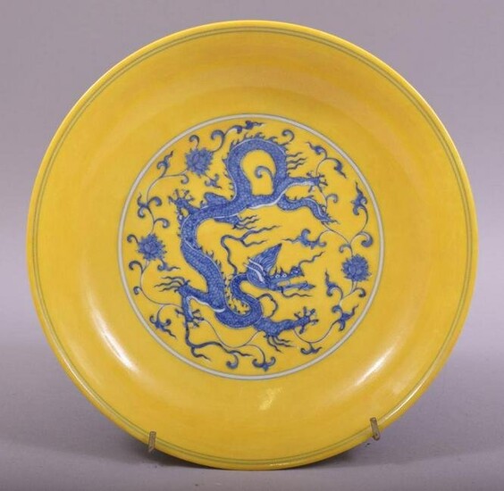 A CHINESE YELLOW GROUND PORCELAIN DRAGON DISH, the