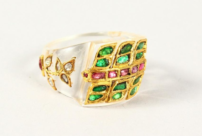 A CRYSTAL AND GOLD, RUBY, DIAMOND AND EMERALD DESIGNER