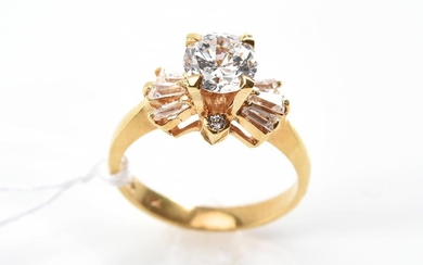 A CUBIC ZIRCONIA DRESS RING IN 18CT GOLD