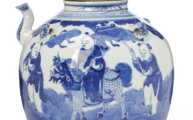 A Chinese 20th century blue and white teapot moulded with four mask...