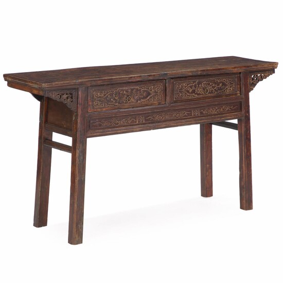 NOT SOLD. A Chinese hardwood altar table with richly carved front. Late 19th century. H....