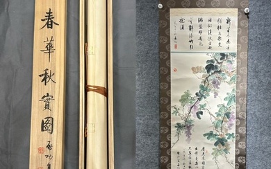A Chinese ink painting of flowers on a vertical scroll, Qi Gong