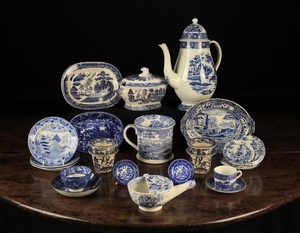 A Collection of Antique Blue & White Transfer Printed Ceramics. To include a Regency baluster coffee pot and lid, 10½ in (26 cm) in height, a sauce tureen & cover, a charming Georgian pearlware teabowl & saucer, four willow pattern potted meat pots